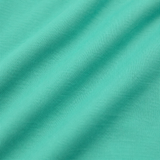 Camiseta infantil oversize color menta con el diseño «Frida Parrot»