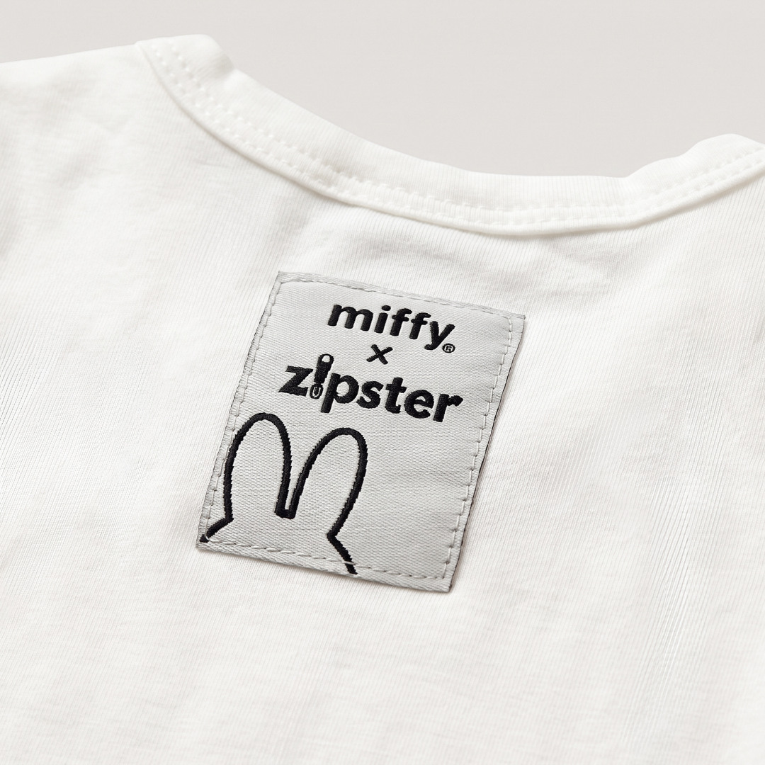 Miffy x Zipster woven label on the Retro Miffy pop-art bamboo baby bodysuit